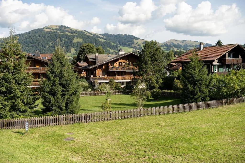 Charming Alpine Apartment Гштад Экстерьер фото